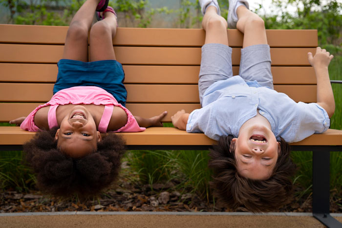 WonderTrek-kids-laying-bench